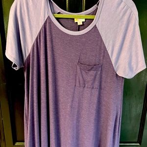 Purple Carlie size Small... fits up to an. L. Very oversized.